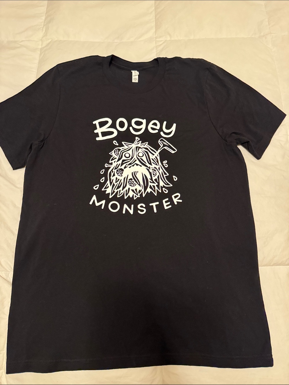 Bella Canvas Black Golf Tee with White "Bogey Monster" Graphic